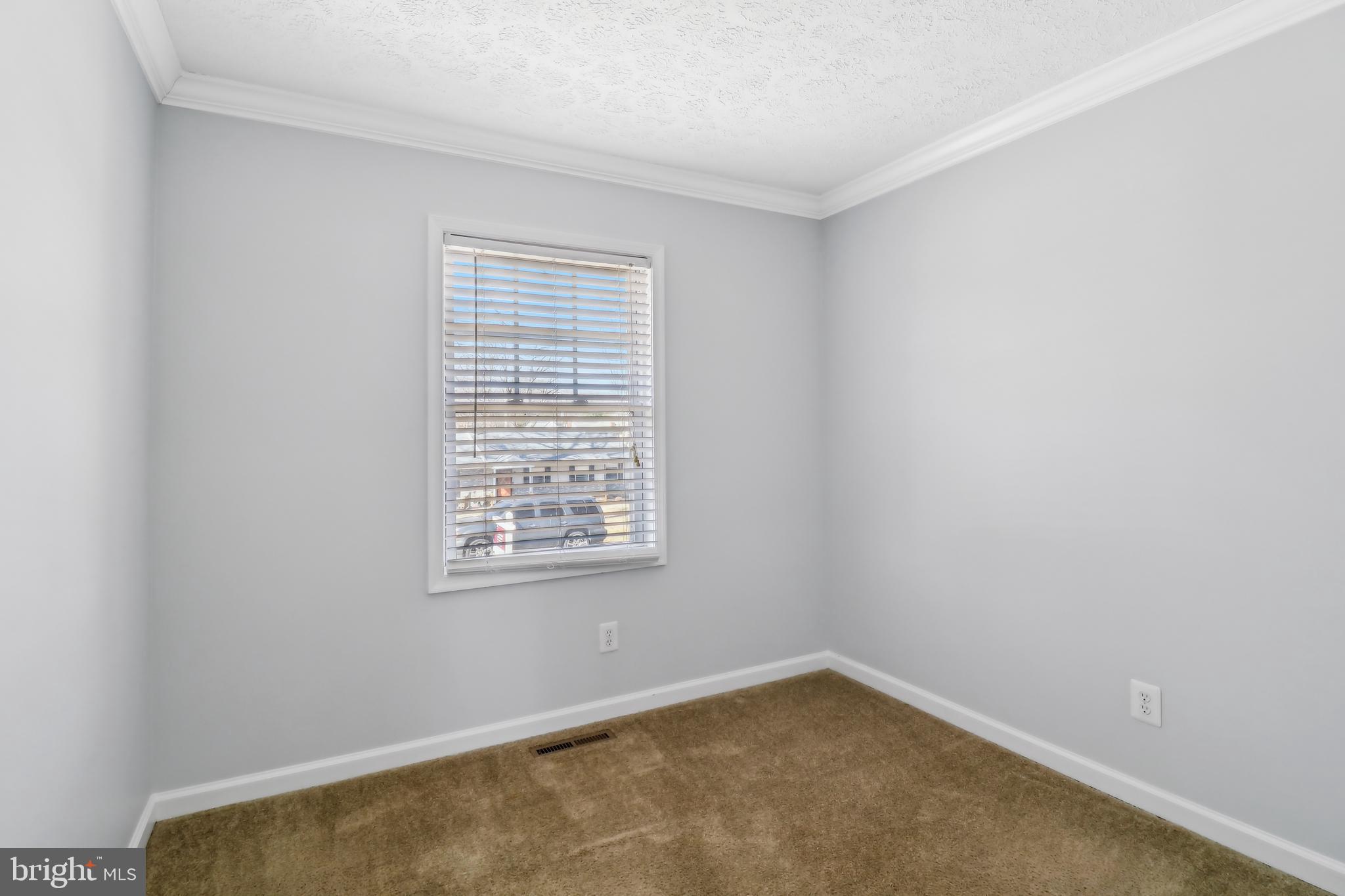 1809 Keymar Road Edgewater, MD 21037 - Photo 10 of 49 an empty room with a window