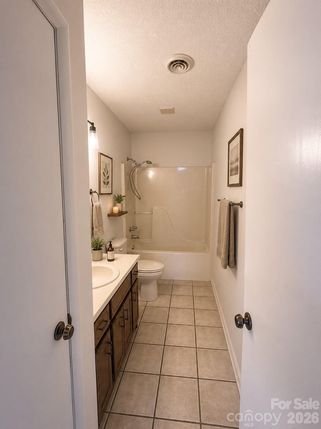 1368 Cajah Mountain Road Hudson, NC 28638 - Photo 43 of 46 a bathroom with a bathtub and a sink
