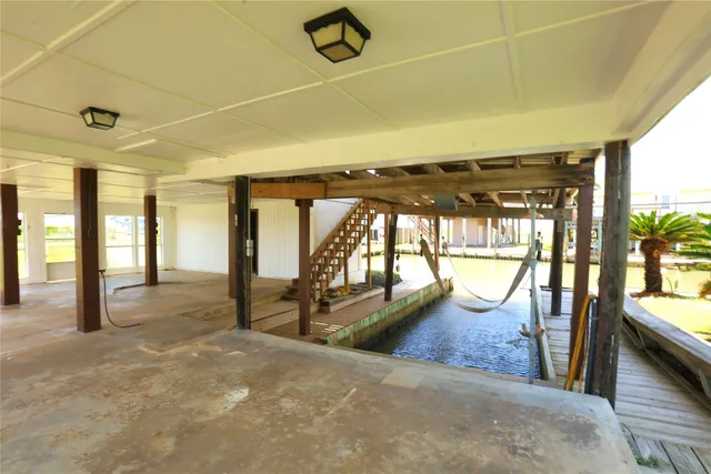 a view of a hall with an entryway