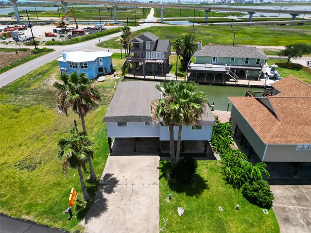 a aerial view of a house with outdoor space