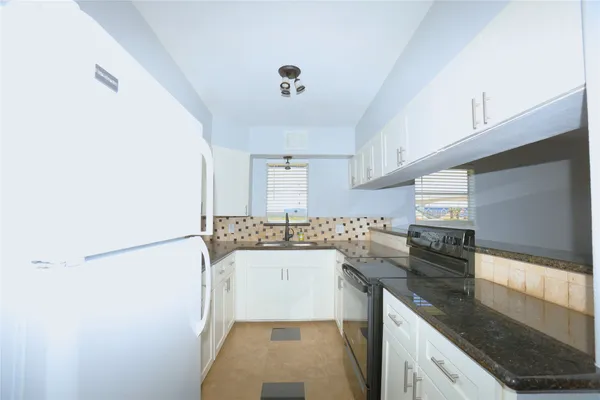 a view of a big room with carpet