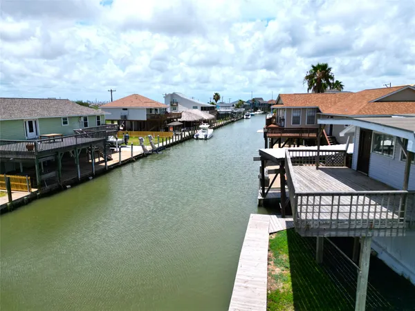 a view of a lake with a house
