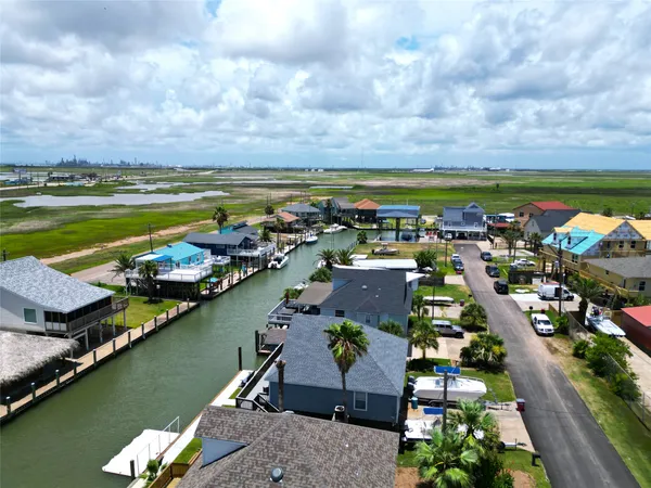 a aerial view of a house with a lake view