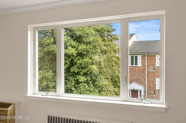 a view of a house that has a windows
