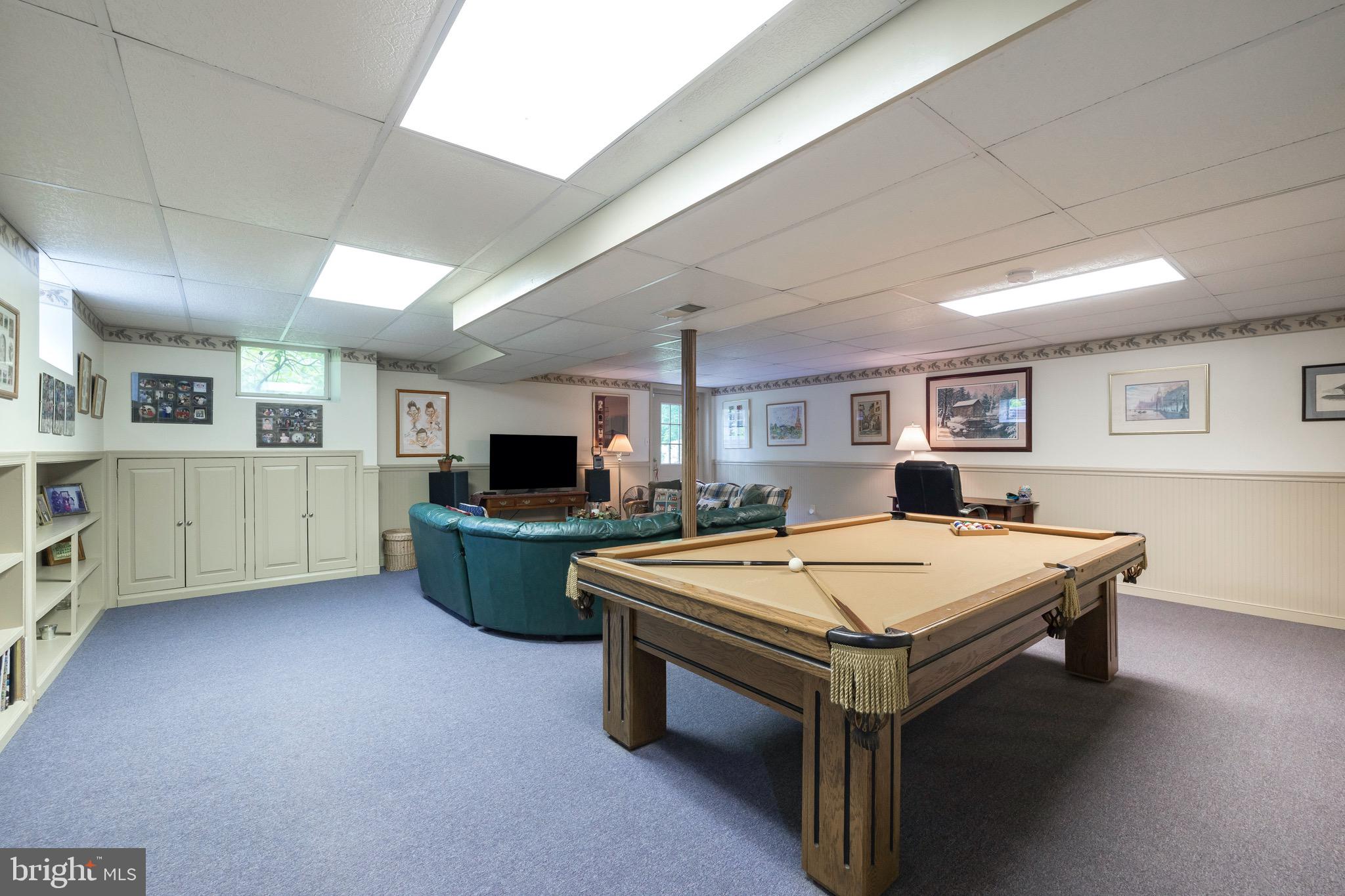 40 Ravine Road Malvern, PA 19355 - Photo 35 of 64 Finished basement with living area & pool table