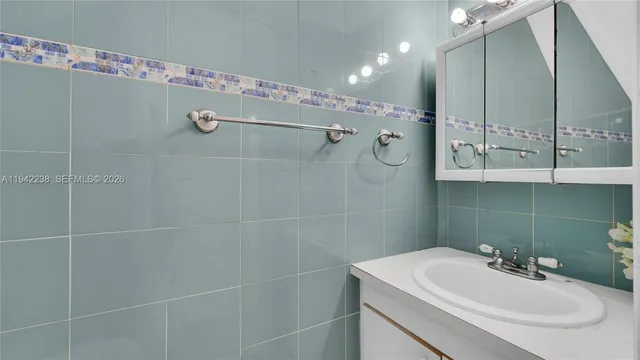 a view of a room with a floor to ceiling window and shower