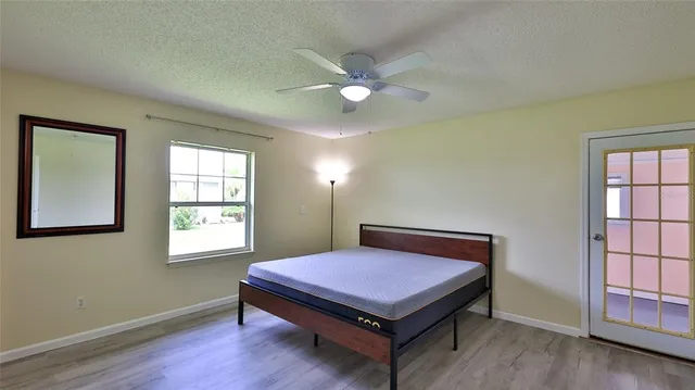 a bathroom with a sink mirror toilet and bathtub