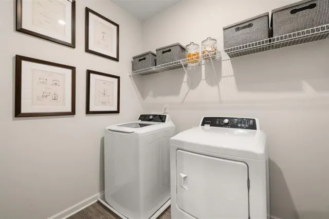 a utility room with dryer and washer