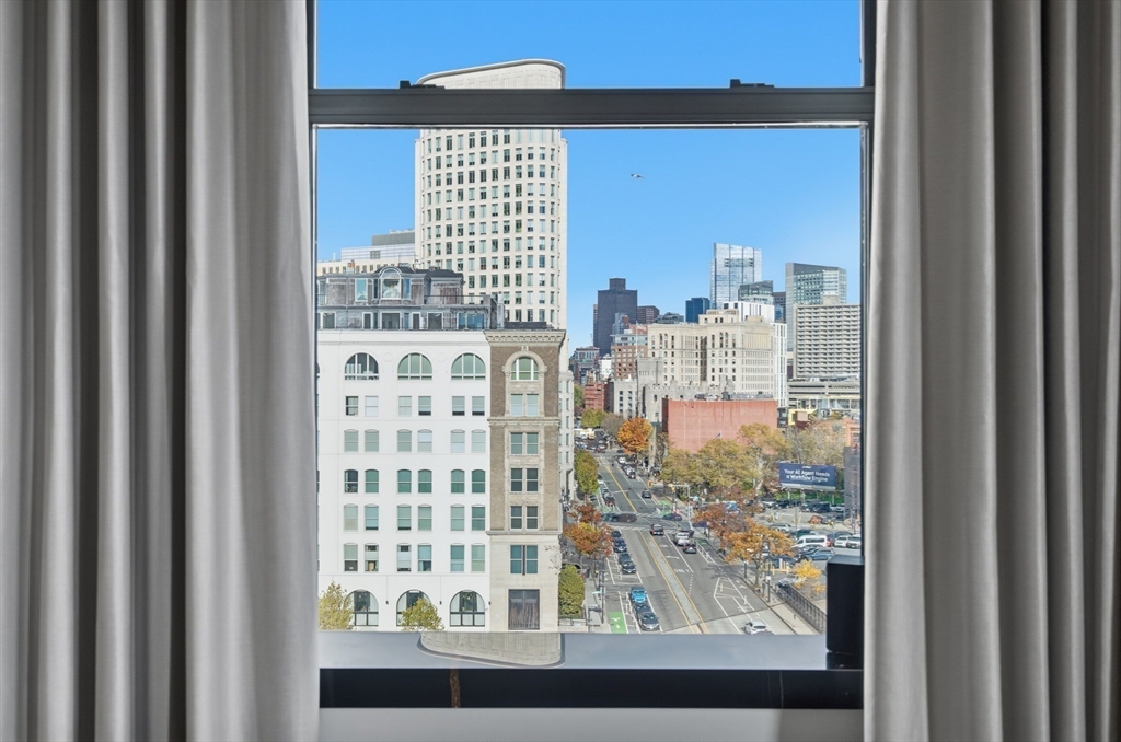 285 Columbus Avenue, Unit PH 805 Boston, MA 02116 - Photo 28 of 42 a view of a city from a balcony