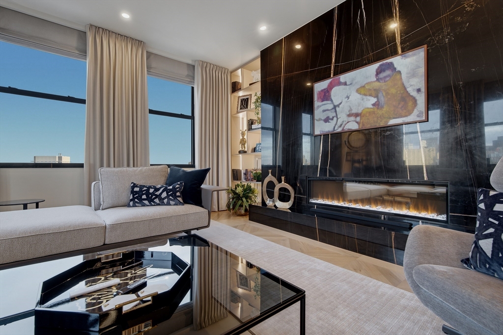 285 Columbus Avenue, Unit PH 805 Boston, MA 02116 - Photo 3 of 42 a living room with furniture