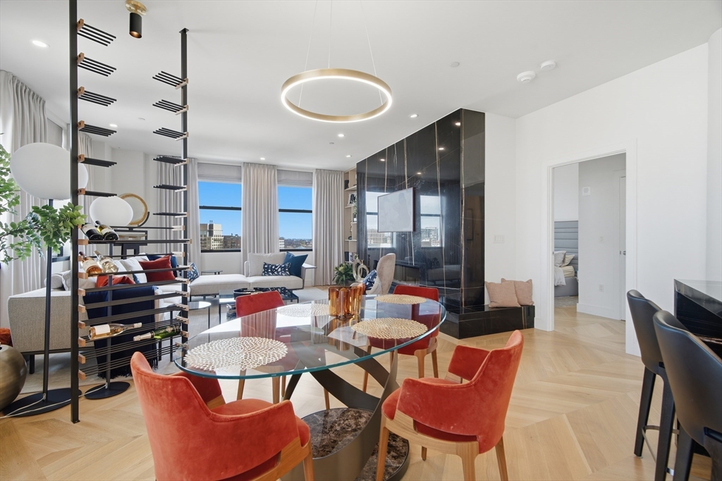 285 Columbus Avenue, Unit PH 805 Boston, MA 02116 - Photo 7 of 42 a outdoor space with lots of furniture and glass door