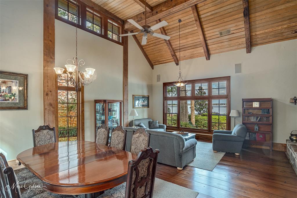 3045 Risinger Drive Shreveport, LA 71119 - Photo 11 of 40 a dining room with furniture a chandelier and wooden floor