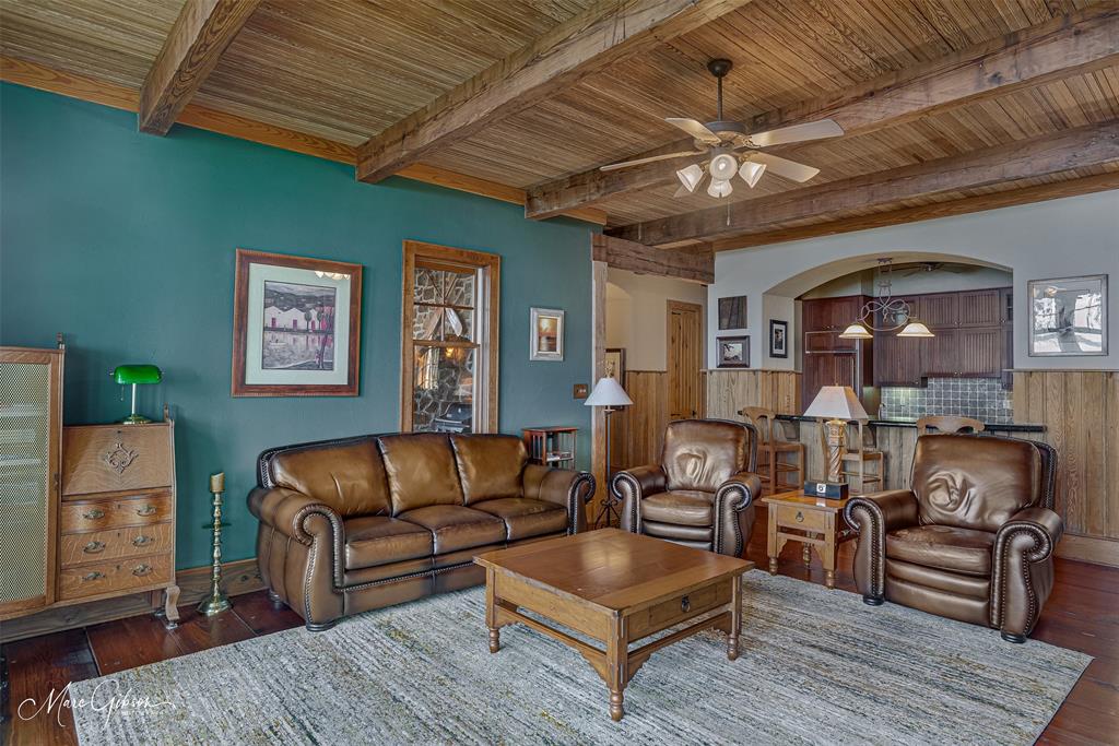 3045 Risinger Drive Shreveport, LA 71119 - Photo 16 of 40 a living room with furniture and a wooden floor