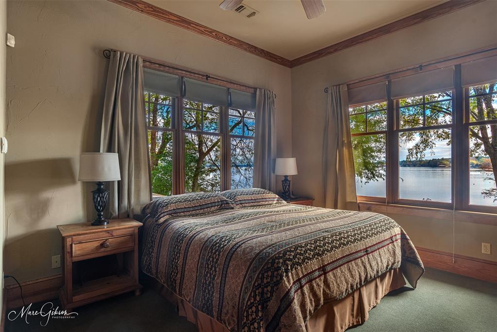 3045 Risinger Drive Shreveport, LA 71119 - Photo 25 of 40 a bedroom with a bed and a large window