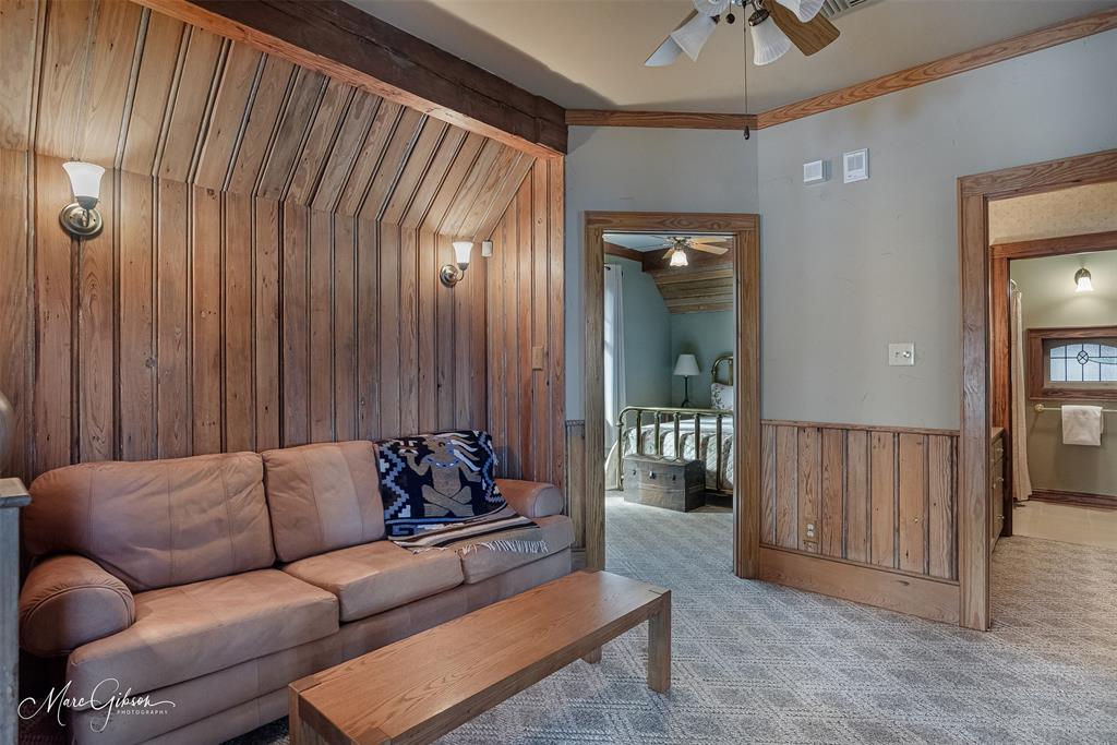 3045 Risinger Drive Shreveport, LA 71119 - Photo 37 of 40 a living room with furniture and a chandelier
