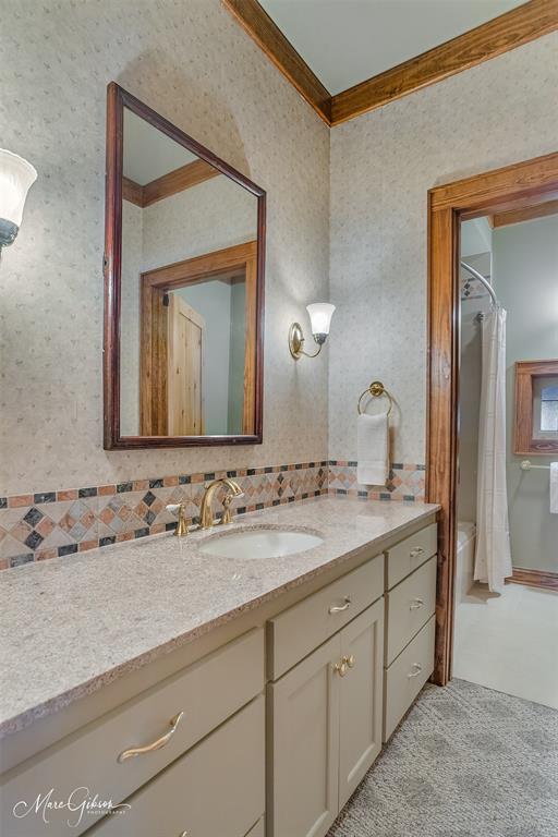 3045 Risinger Drive Shreveport, LA 71119 - Photo 40 of 40 a bathroom with a double vanity sink and a mirror