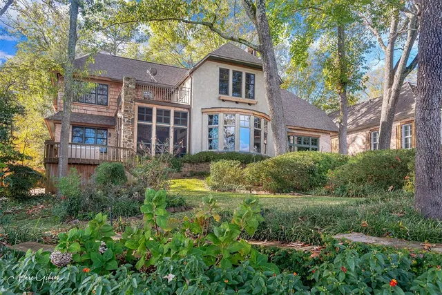 a view of a water pond with green space