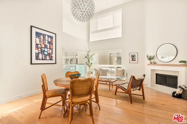 a view of a livingroom with furniture and a fireplace