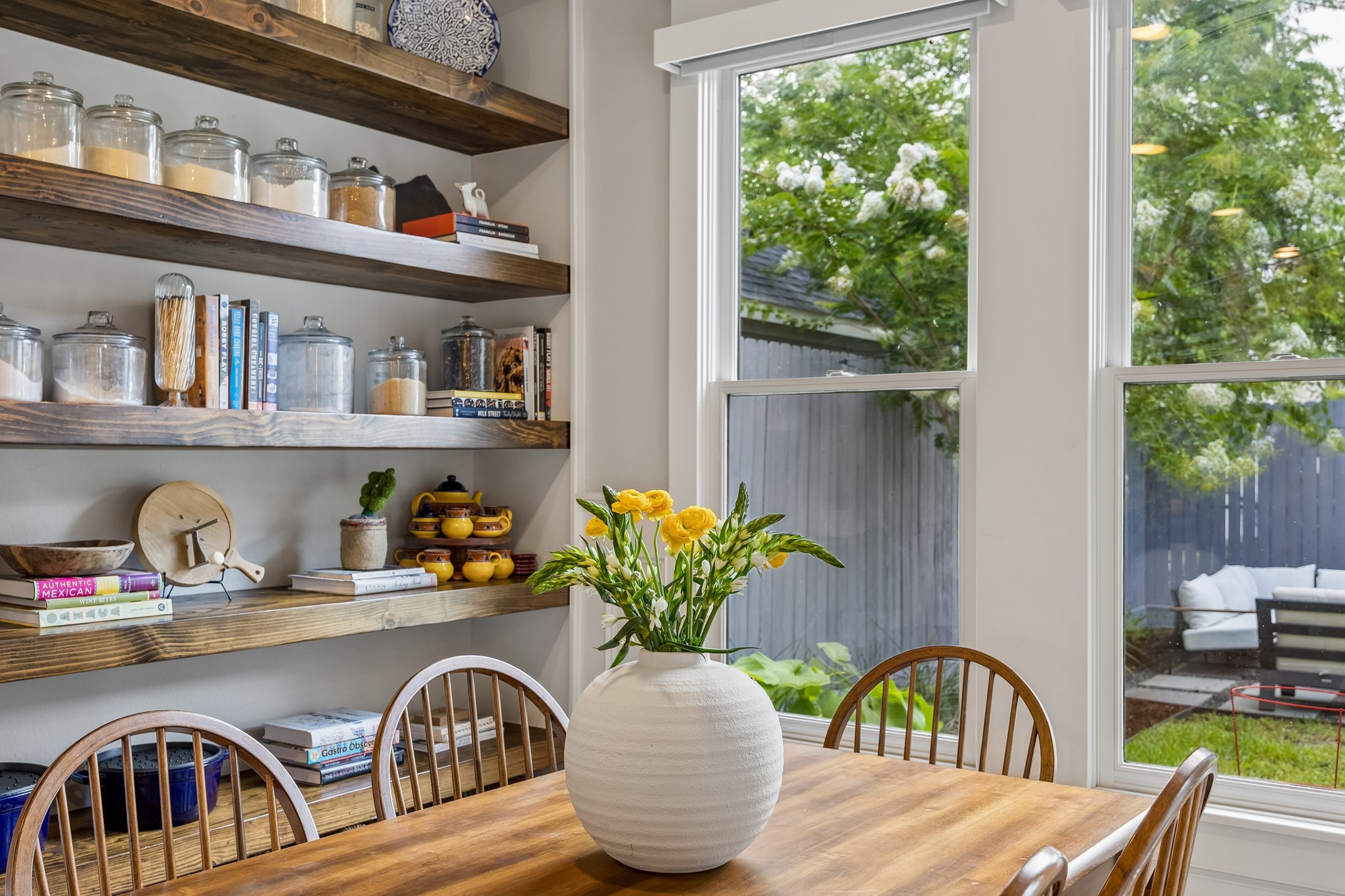 335 West 23rd Street Houston, TX 77008 - Photo 16 of 40 a view of a dining room with furniture window and outside view