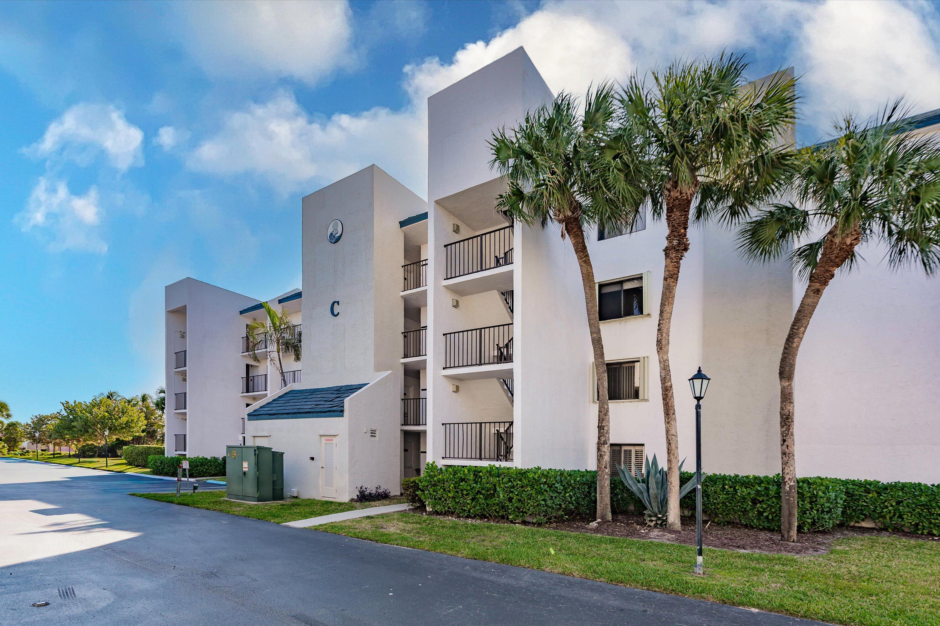 1605 Highway 1, Unit C104 Jupiter, FL 33477 - Photo 19 of 24 1605 US Highway 1 C104 building front 2