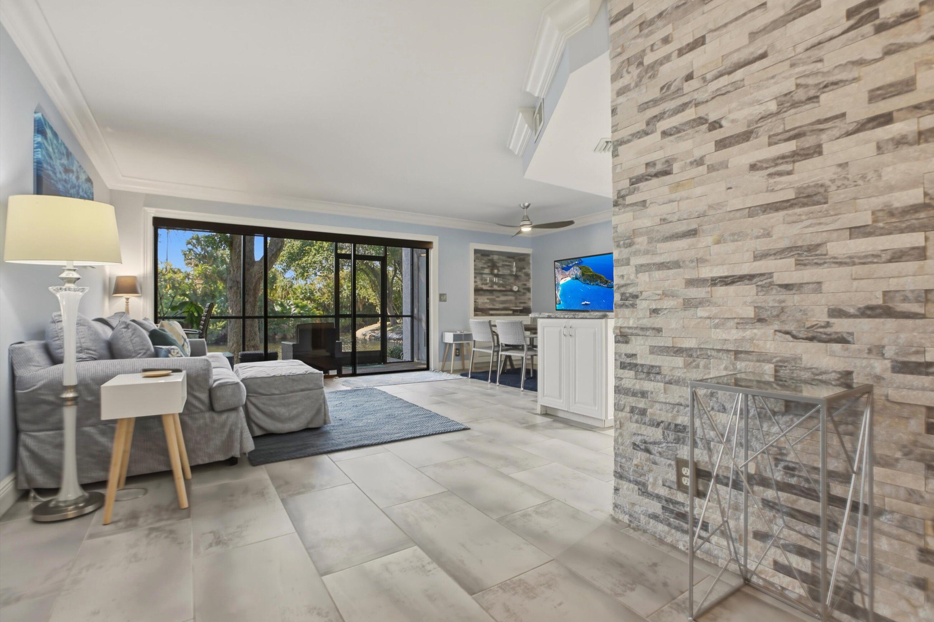 1605 Highway 1, Unit C104 Jupiter, FL 33477 - Photo 4 of 24 1605 US Highway 1 C104 living area