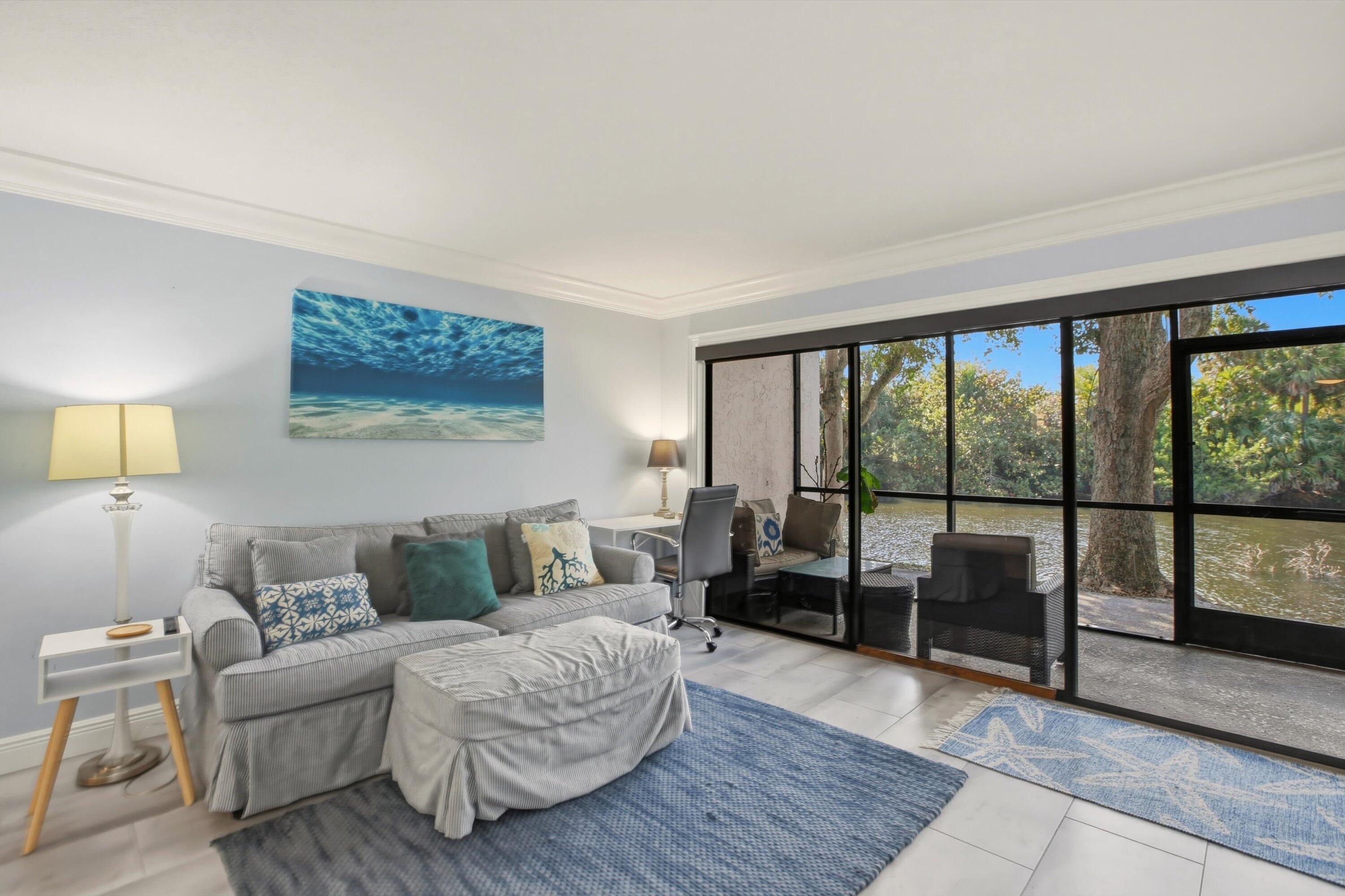 1605 Highway 1, Unit C104 Jupiter, FL 33477 - Photo 5 of 24 1605 US Highway 1 C104 living area 2