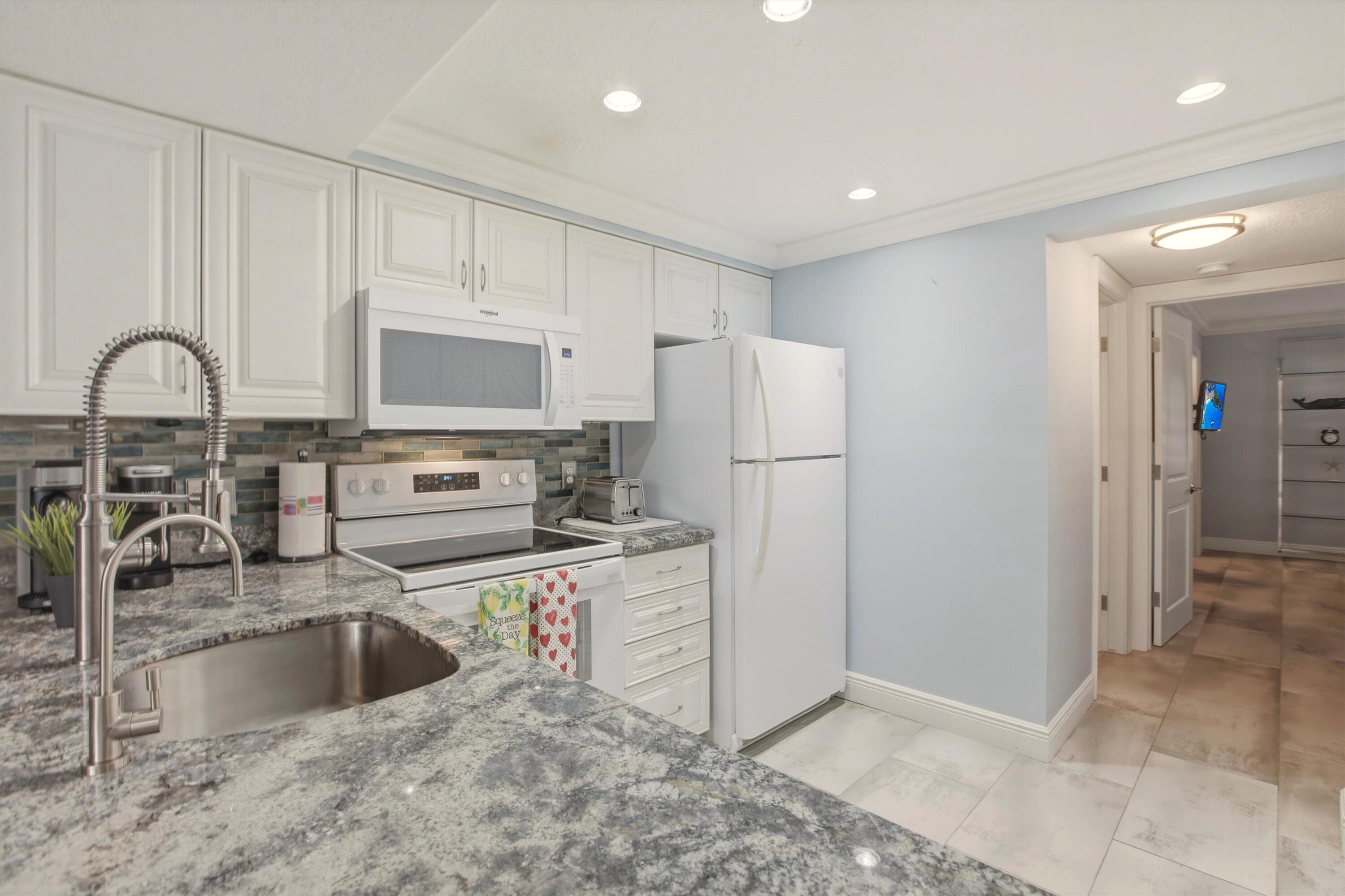 1605 Highway 1, Unit C104 Jupiter, FL 33477 - Photo 8 of 24 1605 US Highway 1 C104 kitchen