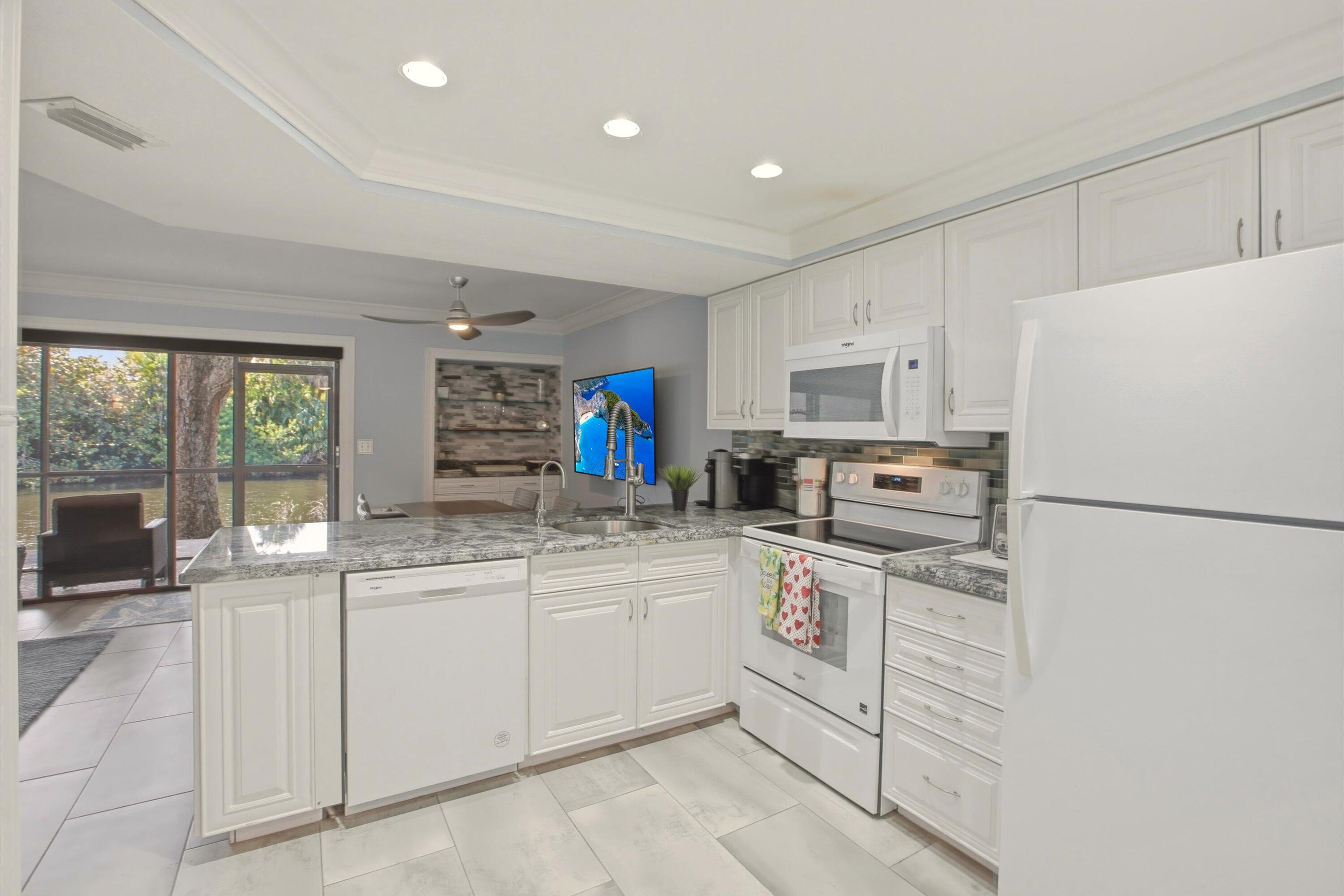 1605 Highway 1, Unit C104 Jupiter, FL 33477 - Photo 9 of 24 1605 US Highway 1 C104 kitchen 2