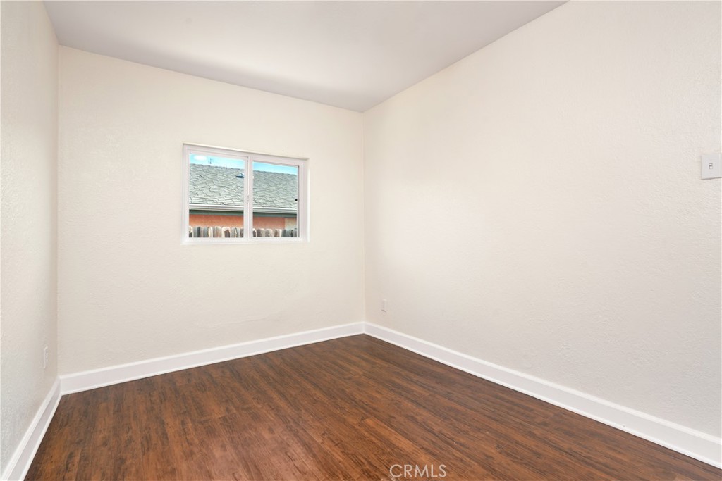 3261 Eagle Street Los Angeles, CA 90063 - Photo 15 of 40 a view of an empty room with wooden floor