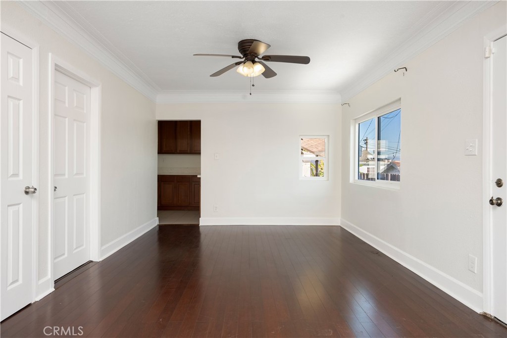 3261 Eagle Street Los Angeles, CA 90063 - Photo 22 of 40 a view of empty room with wooden floor and ceiling fan