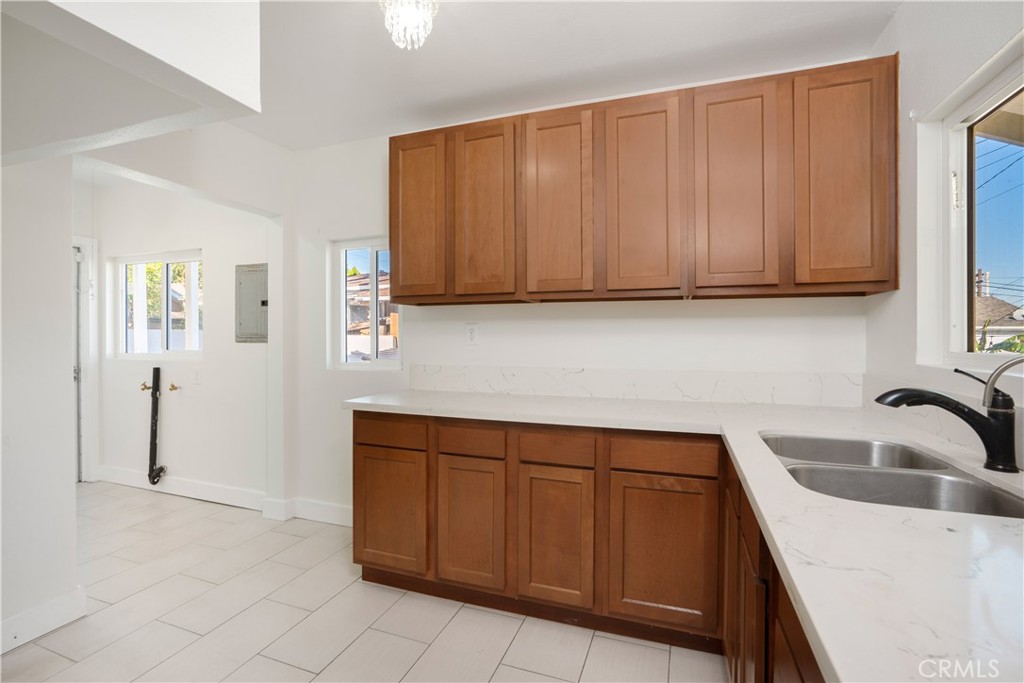 3261 Eagle Street Los Angeles, CA 90063 - Photo 25 of 40 a kitchen with a sink and cabinets