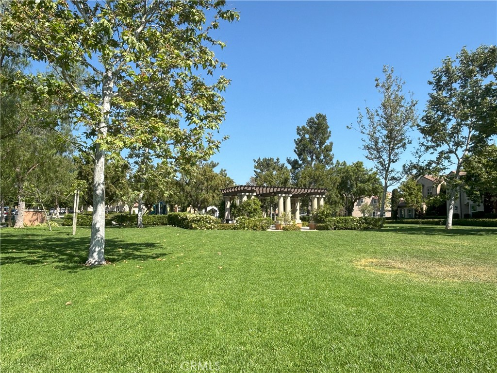 25 Bridge Trail Irvine, CA 92618 - Photo 23 of 25 a front view of a house with a yard