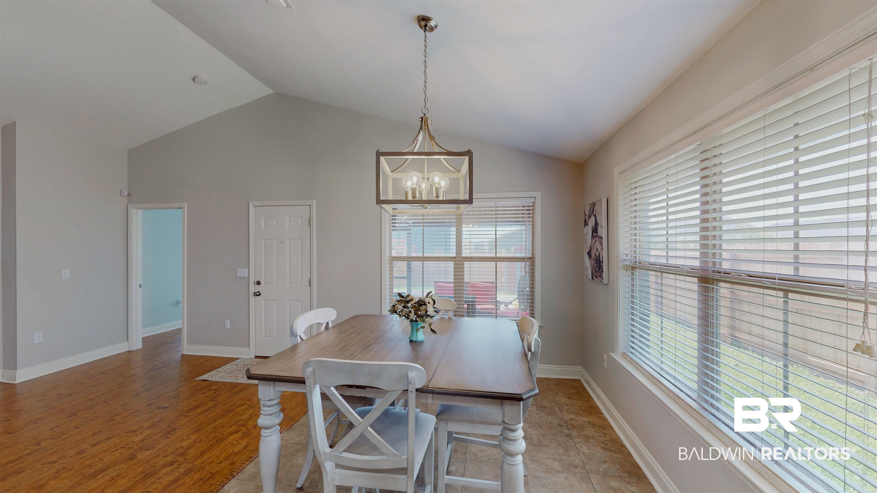 1704 Arcadia Drive Foley, AL 36535 - Photo 23 of 52 Dining space with a chandelier and vaulted ceiling