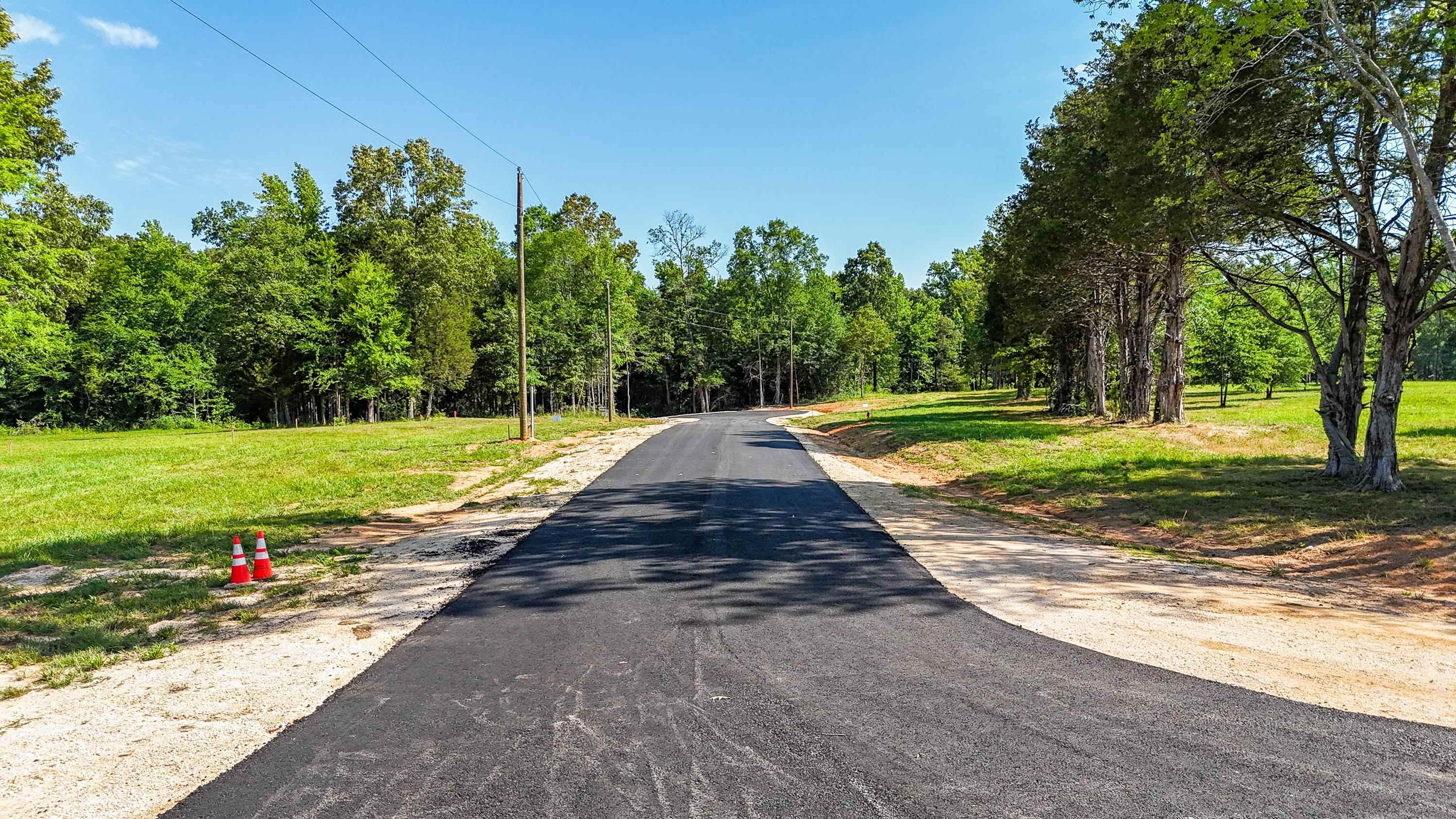0 Grove Lane Savannah, TN 38372 - Photo 20 of 37 a view of a park with large trees with wooden fence