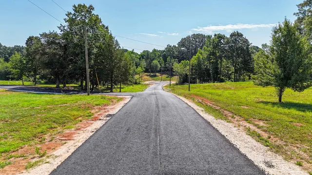 swimming pool with view of lake view
