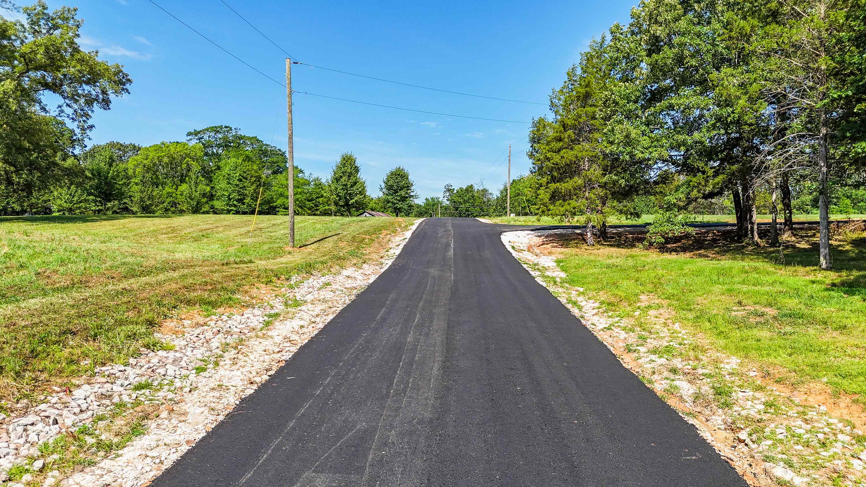 0 Grove Lane Savannah, TN 38372 - Photo 24 of 37 a view of a swimming pool with a yard