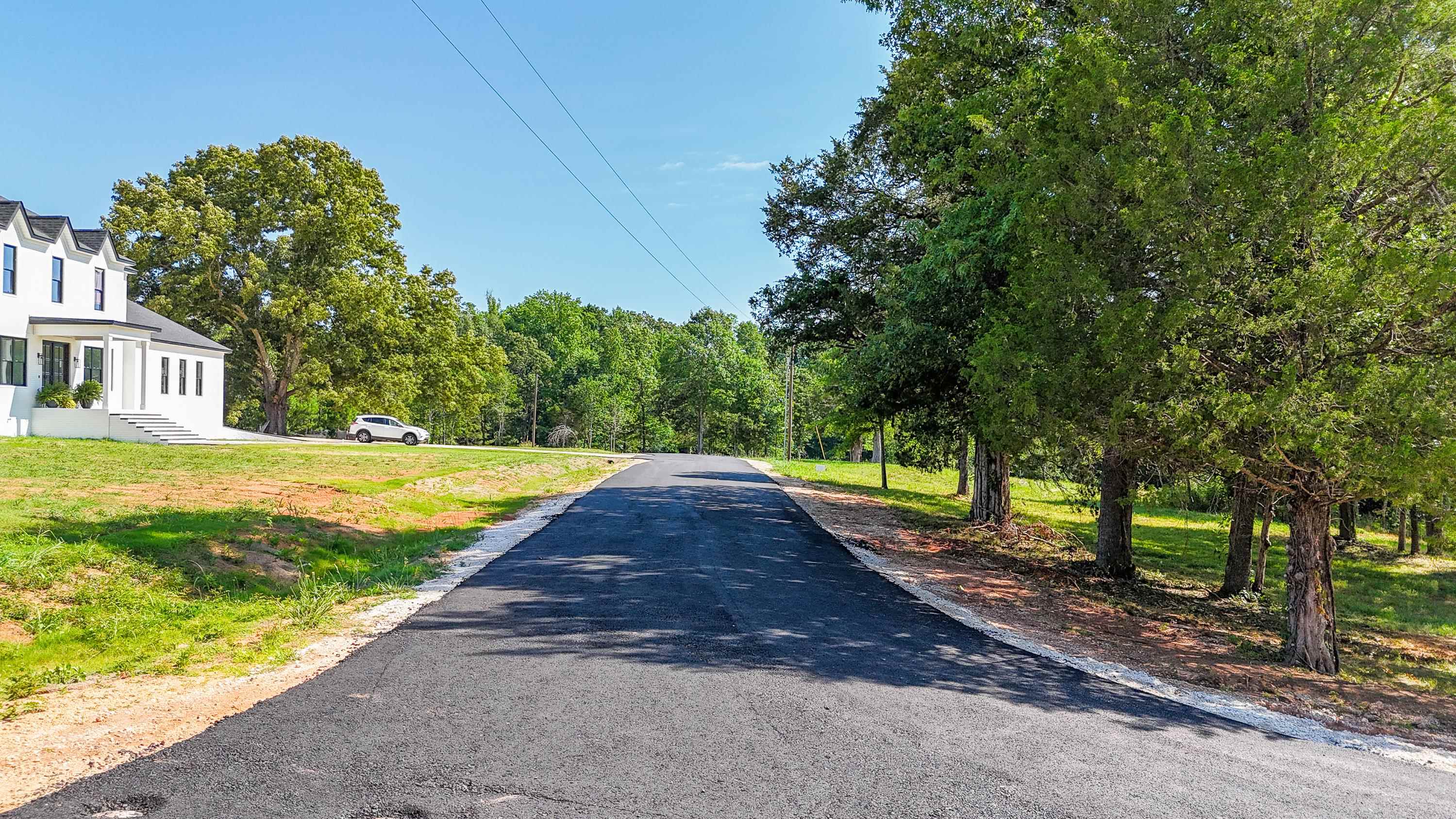 0 Grove Lane Savannah, TN 38372 - Photo 25 of 37 a view of a house with a yard