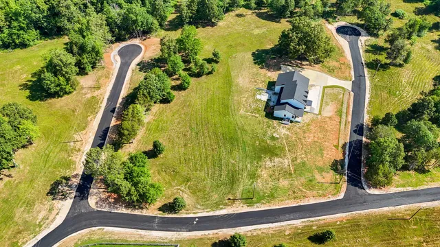 a view of a swimming pool with an outdoor space