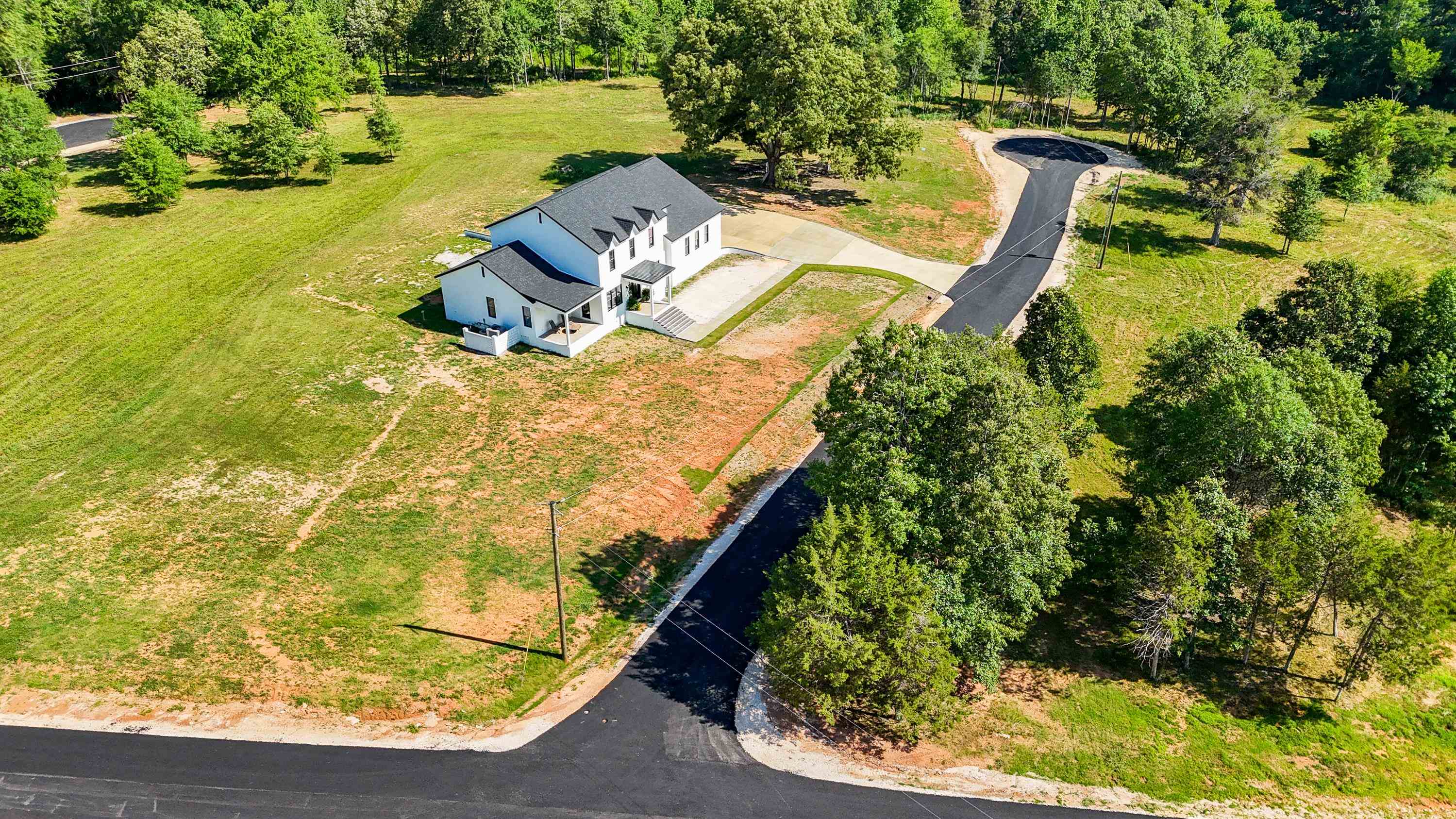 0 Grove Lane Savannah, TN 38372 - Photo 32 of 37 a view of a swimming pool with an outdoor space