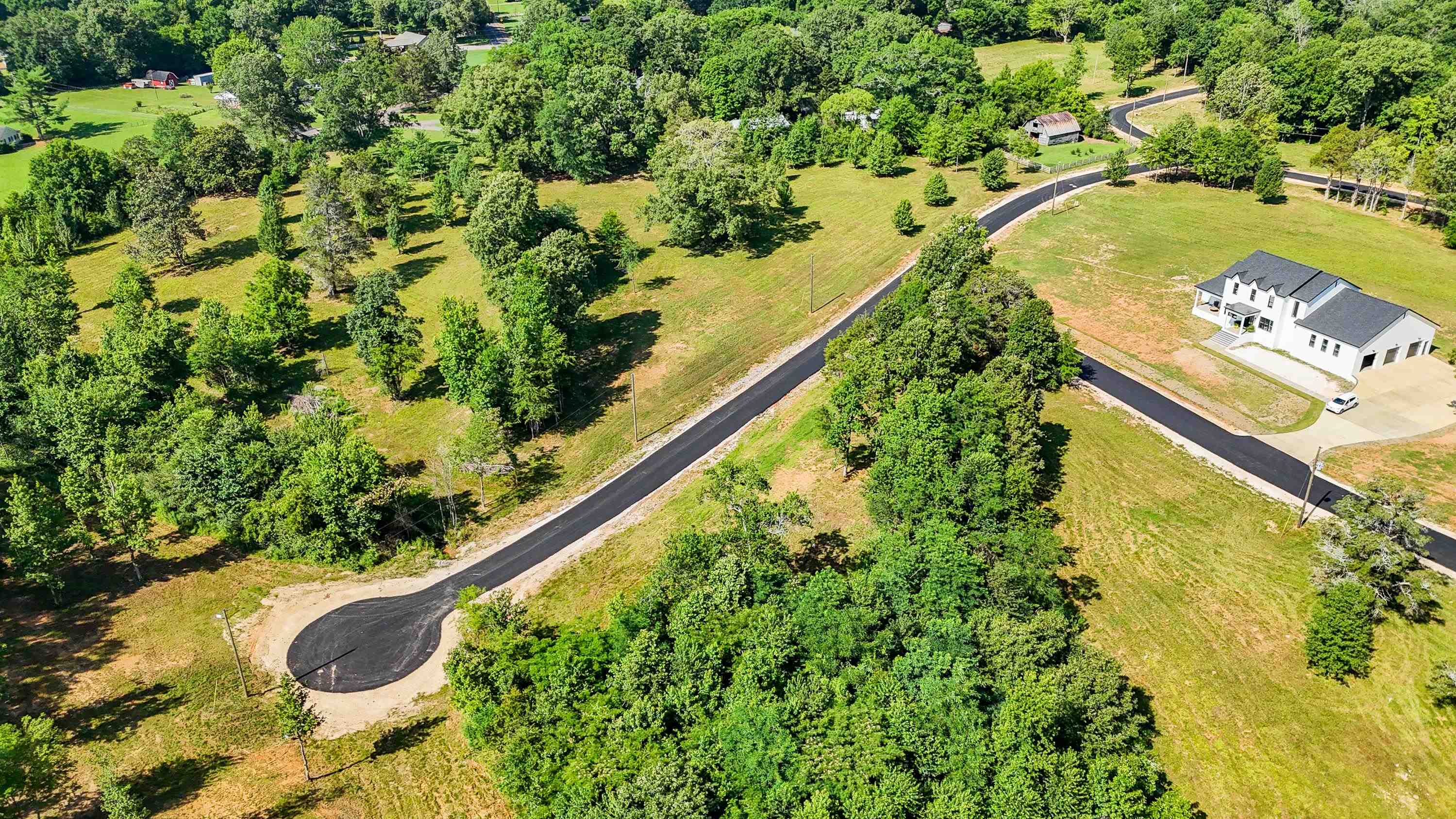0 Grove Lane Savannah, TN 38372 - Photo 33 of 37 a view of swimming pool from a lake view