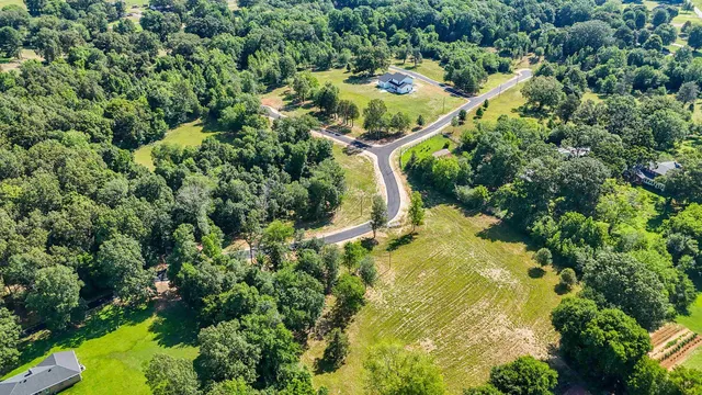 a view of a swimming pool from a balcony