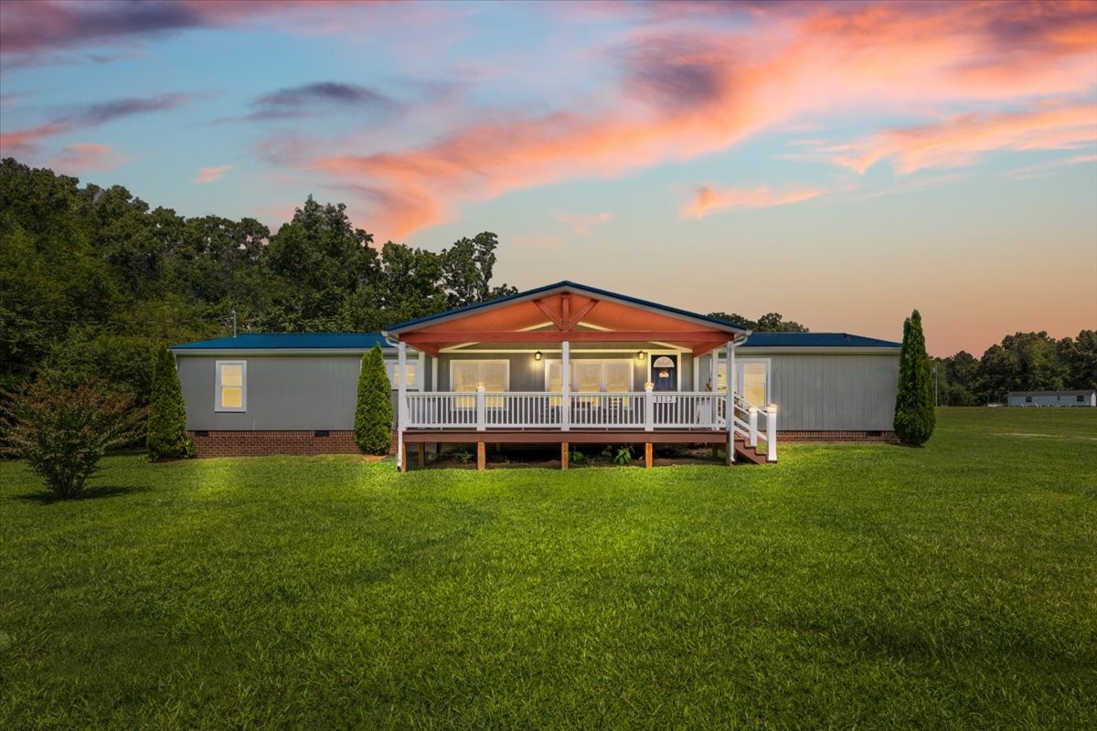 1112 Garners Creek Road Dickson, TN 37055 - Photo 1 of 57 a view of a house with a yard