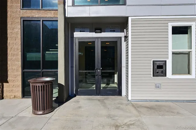 a front view of a house with glass windows