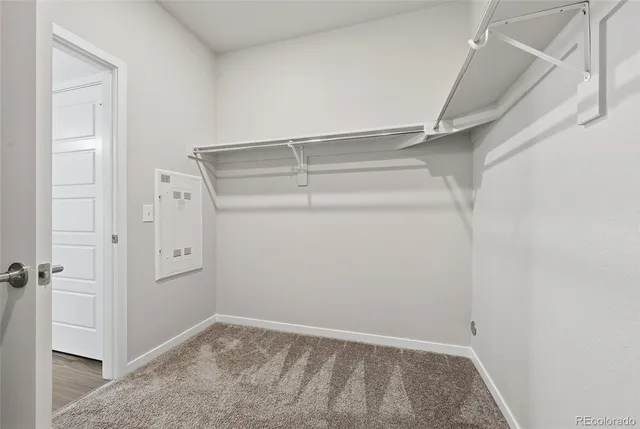 a view of an empty walk in closet