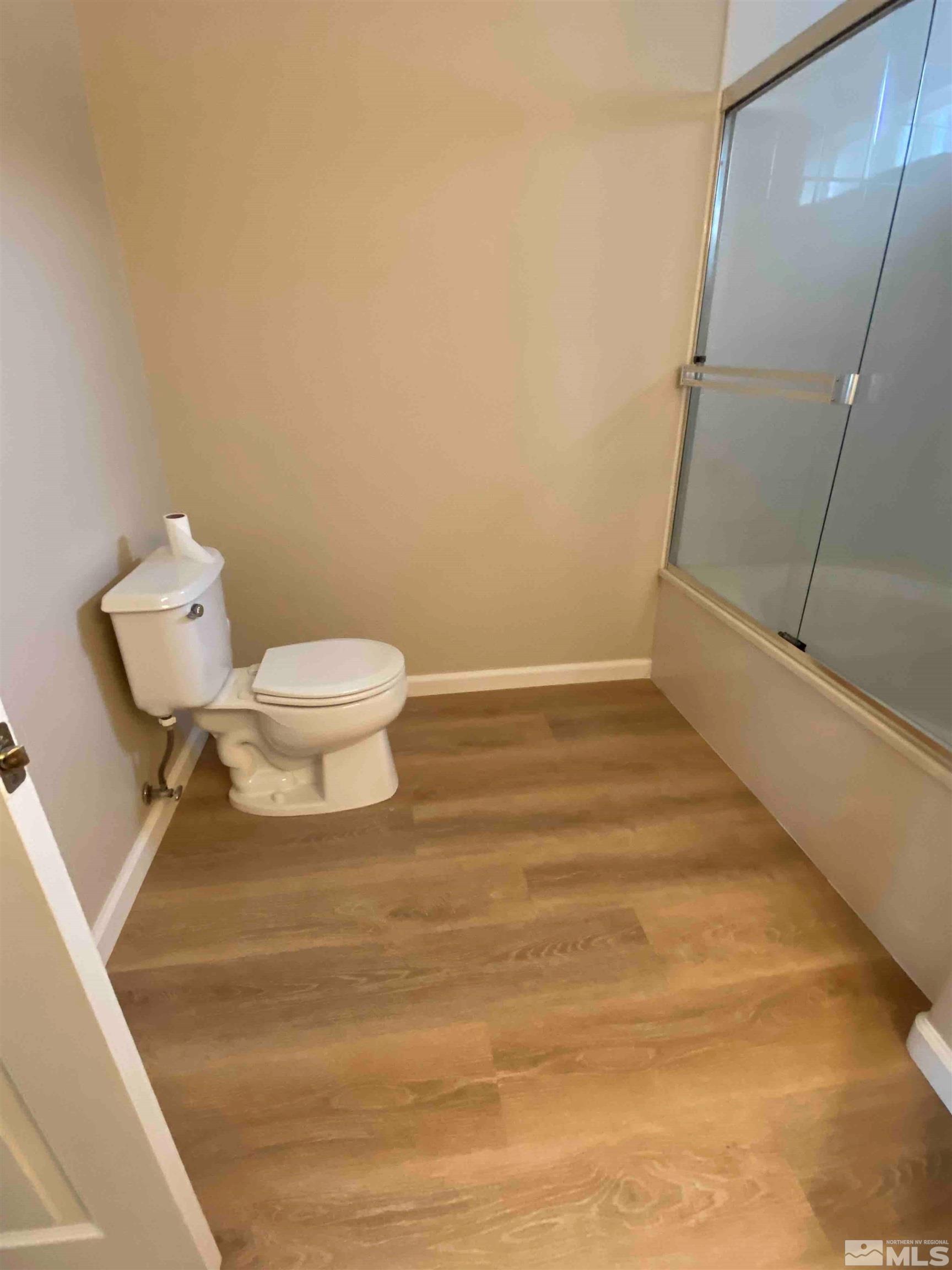 900 S Meadows, Unit 3722 Reno, NV 89521 - Photo 17 of 26 a bathroom with a toilet and a shower