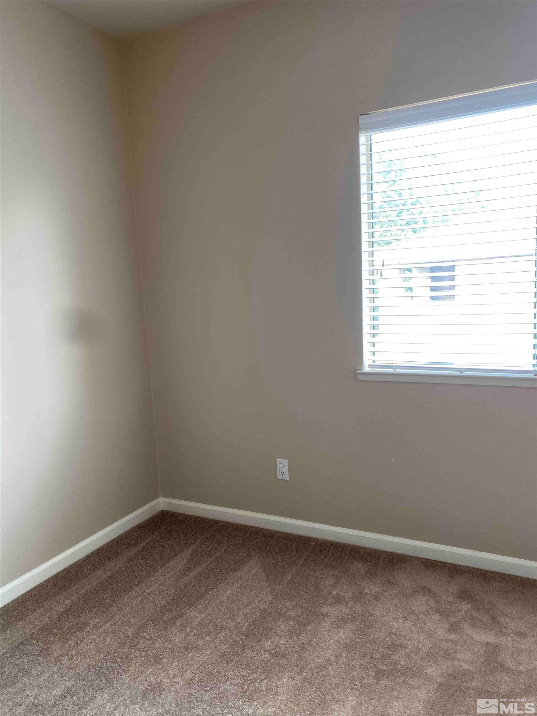 900 S Meadows, Unit 3722 Reno, NV 89521 - Photo 19 of 26 an empty room with a window