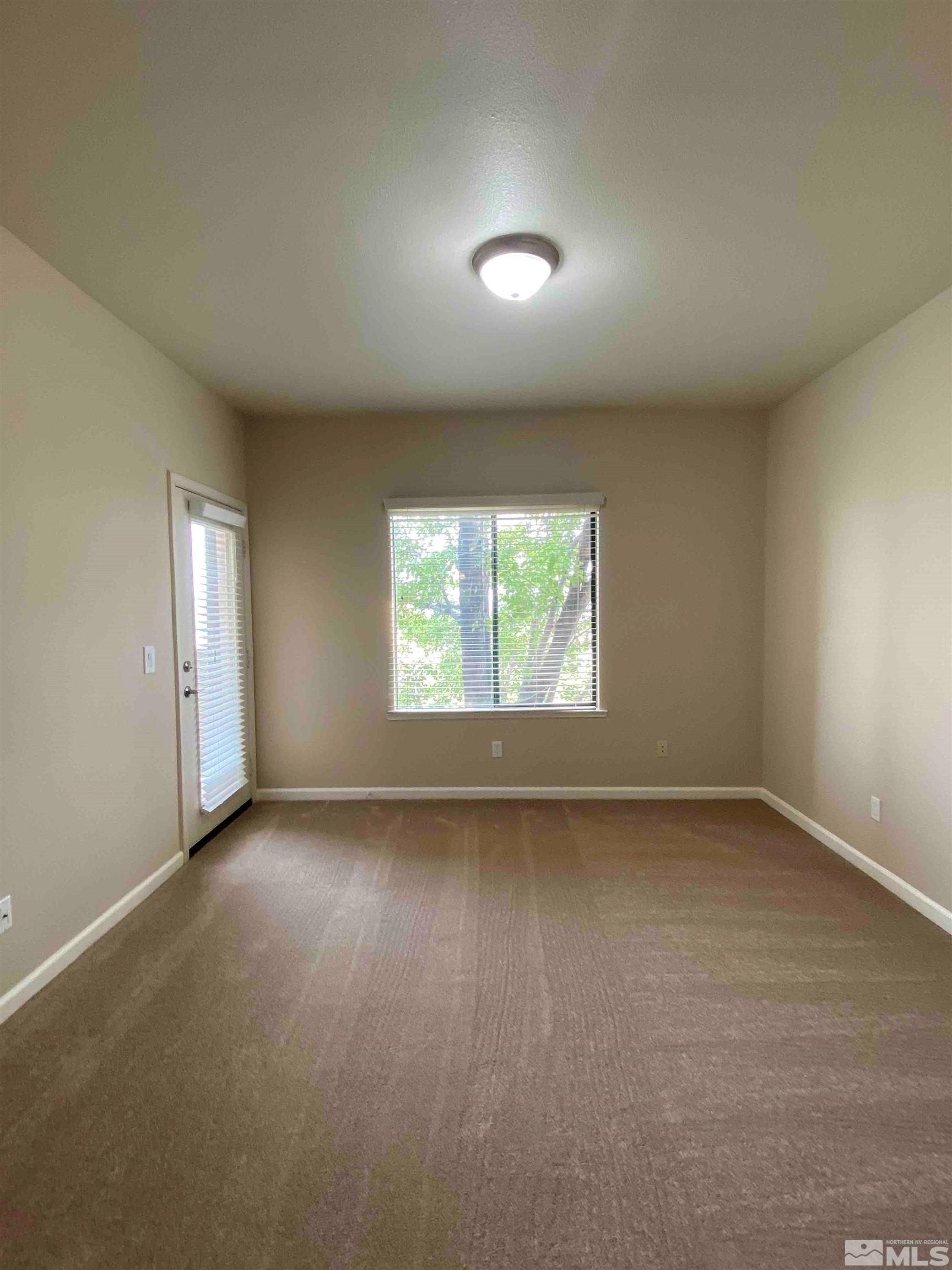 900 S Meadows, Unit 3722 Reno, NV 89521 - Photo 20 of 26 an empty room with a window