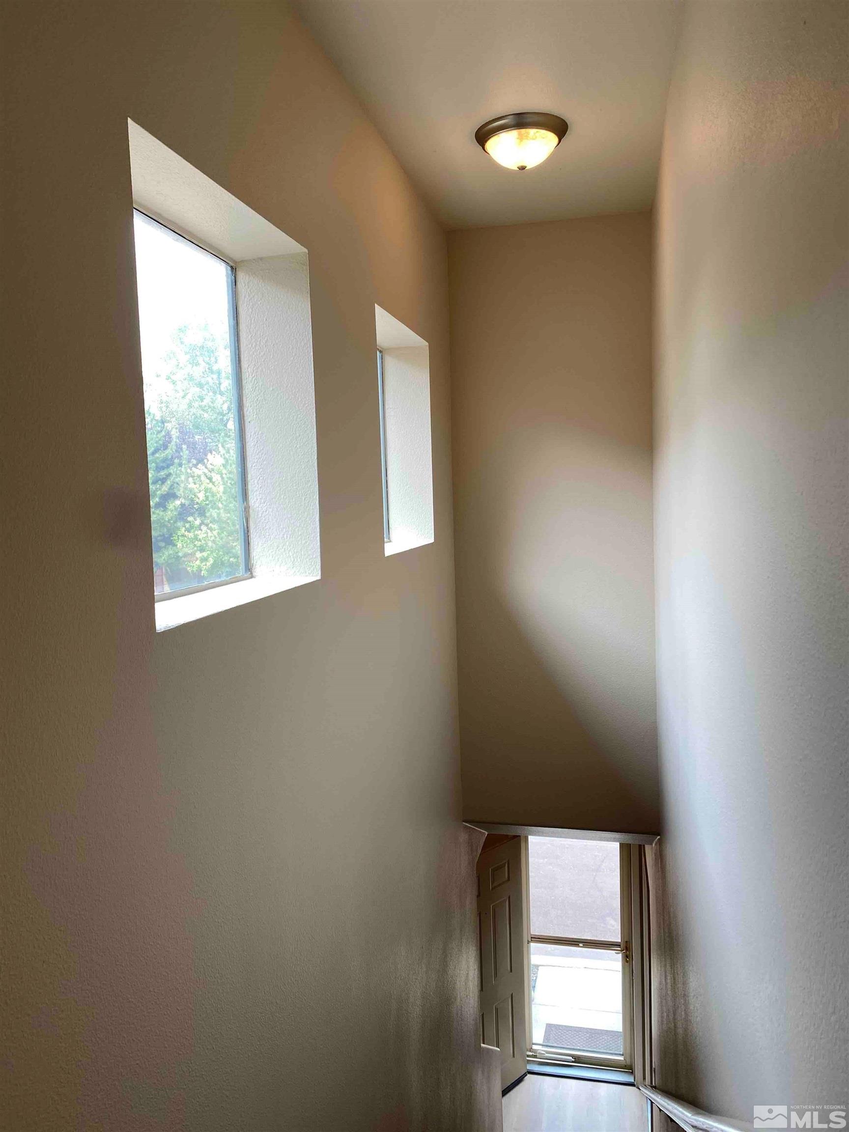 900 S Meadows, Unit 3722 Reno, NV 89521 - Photo 3 of 26 an entryway of a room with windows