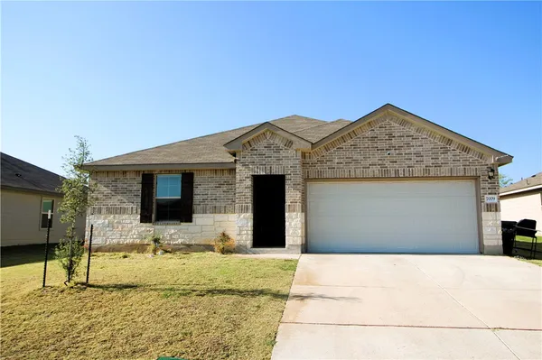 a front view of house with yard