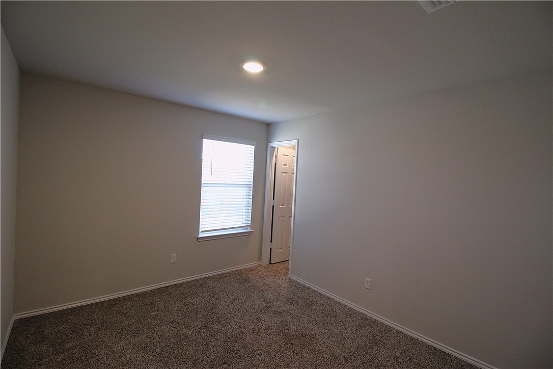 7009 Guadalupe Road China Spring, TX 76633 - Photo 15 of 20 an empty room with windows